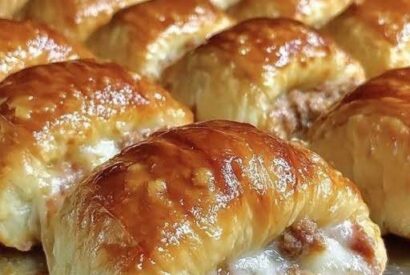 Thumbnail for Cheesy Sausage Crescent Roll-Ups